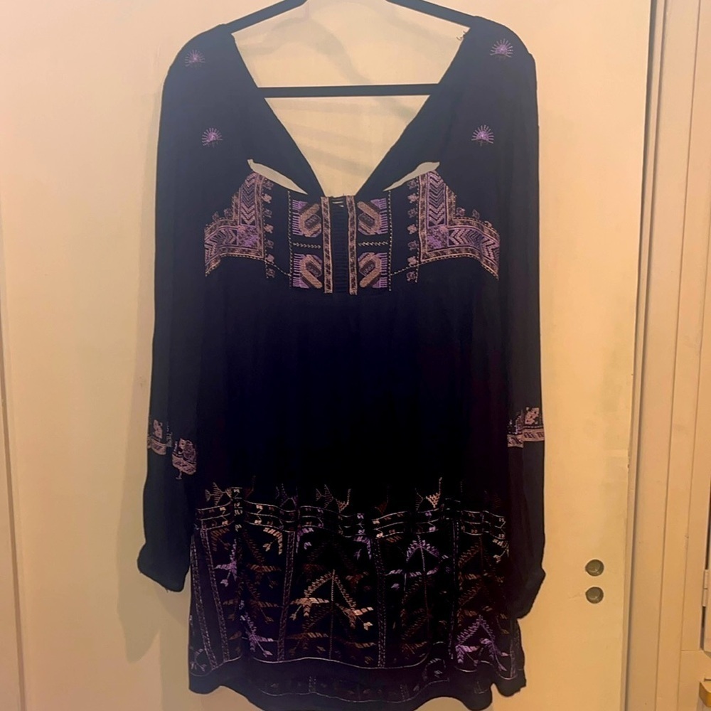 Free People black mini dress size XS with back tie and deep V bk w/ embroidery